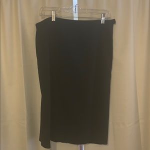 Black skirt, side zipper, small sexy back slit.